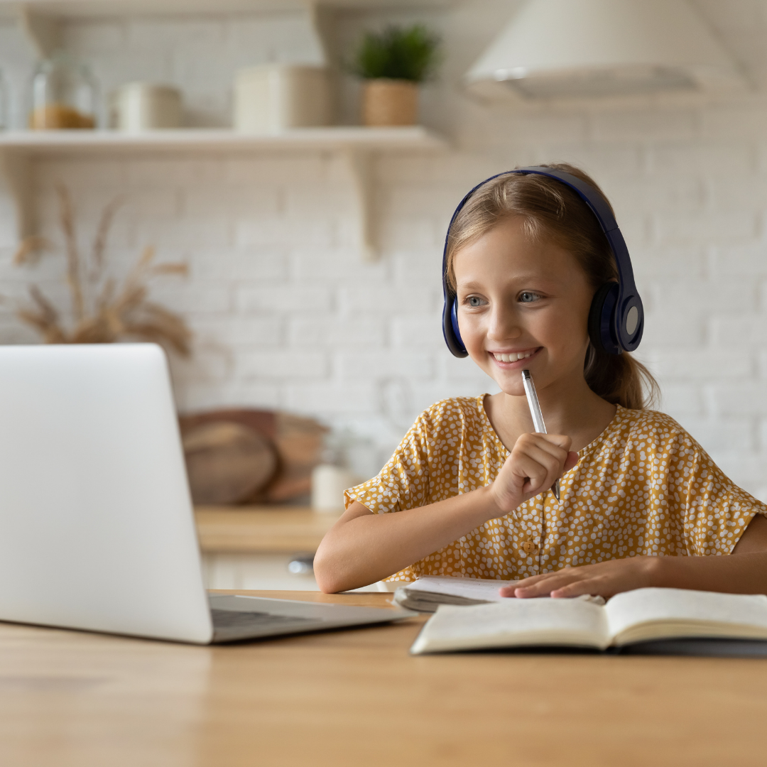 Child with computer smiles